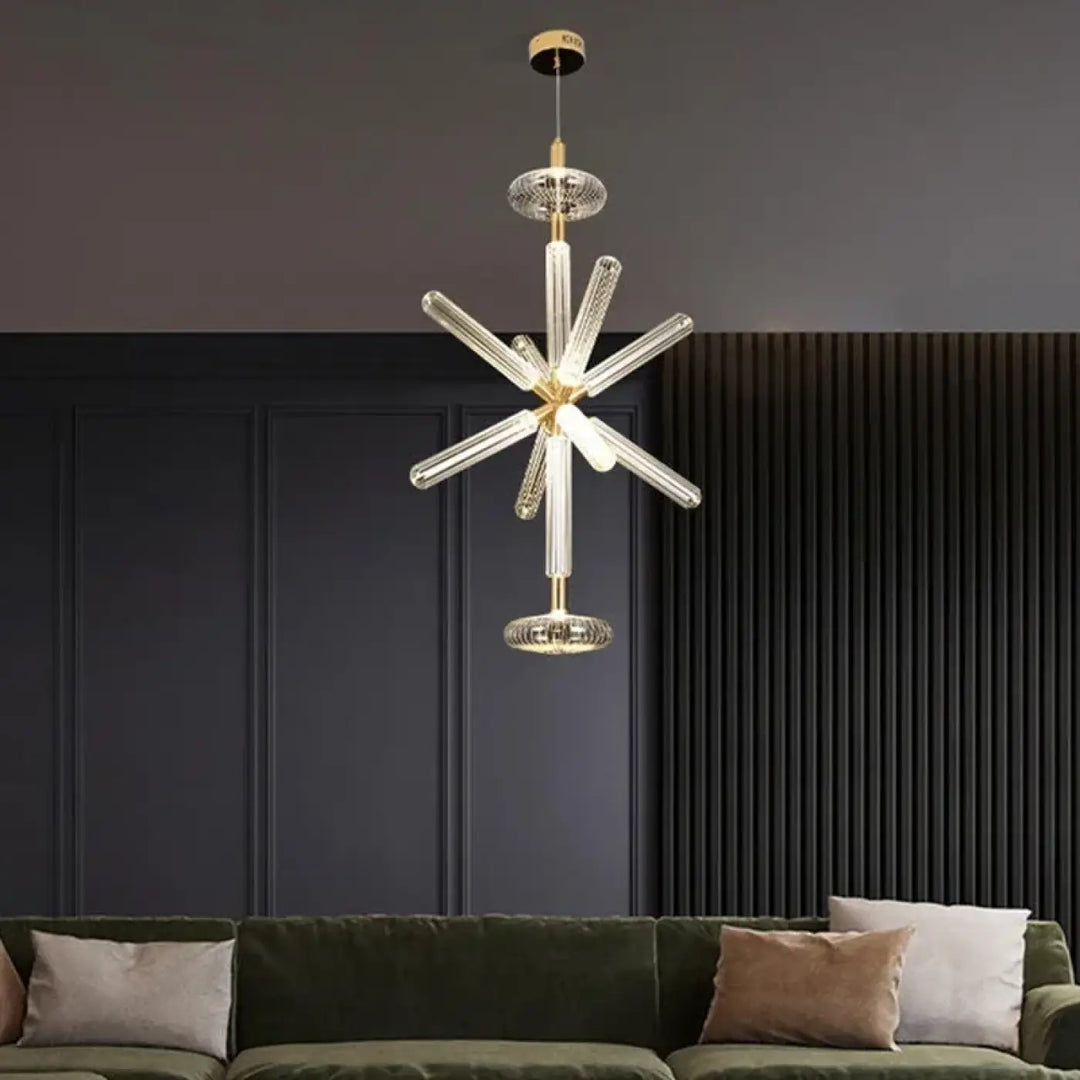 Suspension luminaire striel avec bras en verre cannelé clair et accents métalliques dorés style suspension luminaire artistique