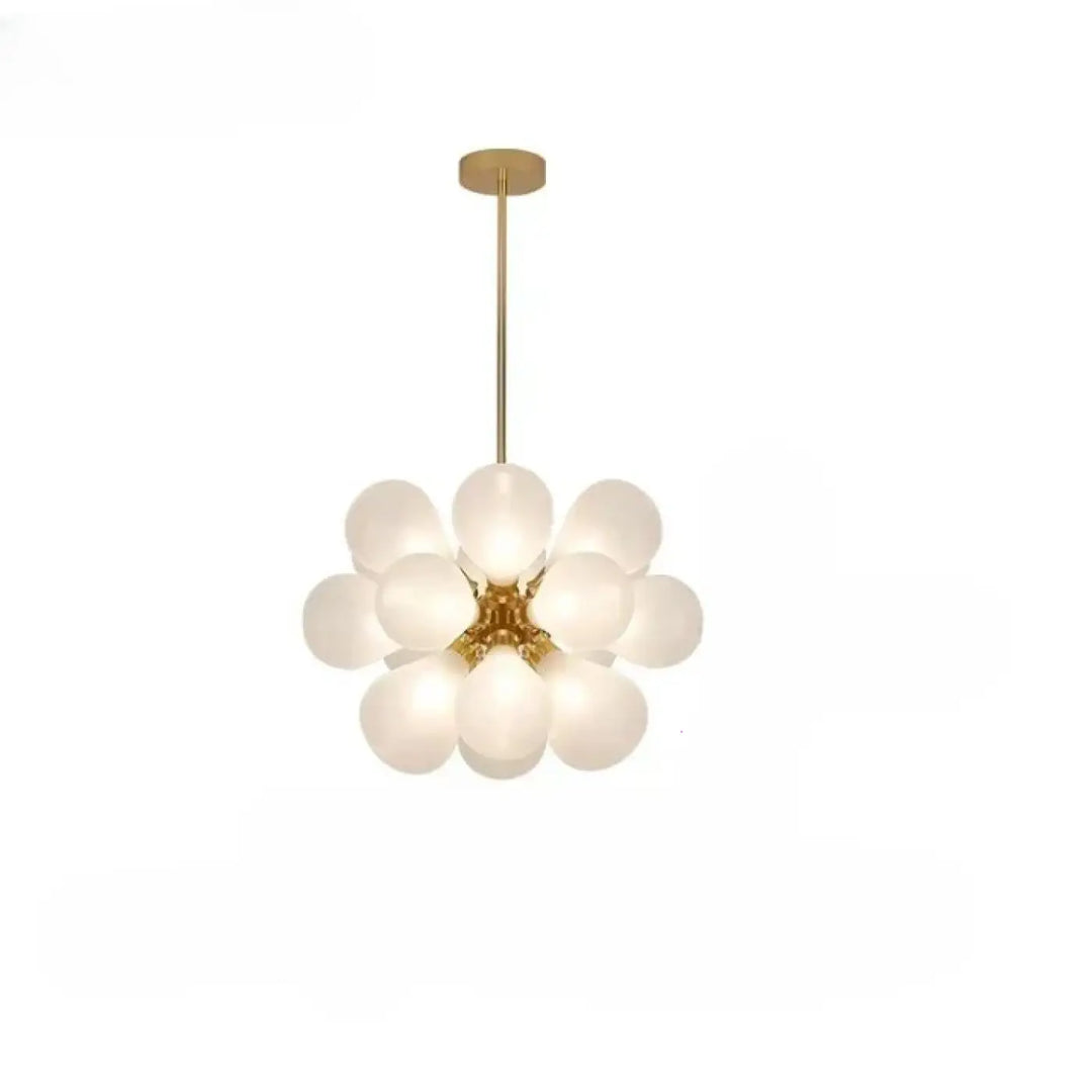 Suspension luminaire anthya doré avec effet floral en verre soufflé et globes en verre dépoli en forme de fleur