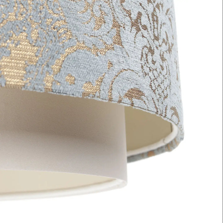 Suspension luminaire doblo en tissu damassé bleu clair et or avec doublure crème pour un éclairage élégant