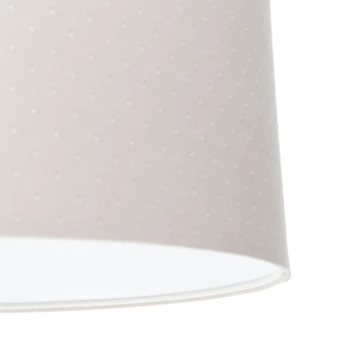 Suspension luminaire blanc crème avec un abat-jour doux à texture subtilement pointillée pour un éclairage élégant