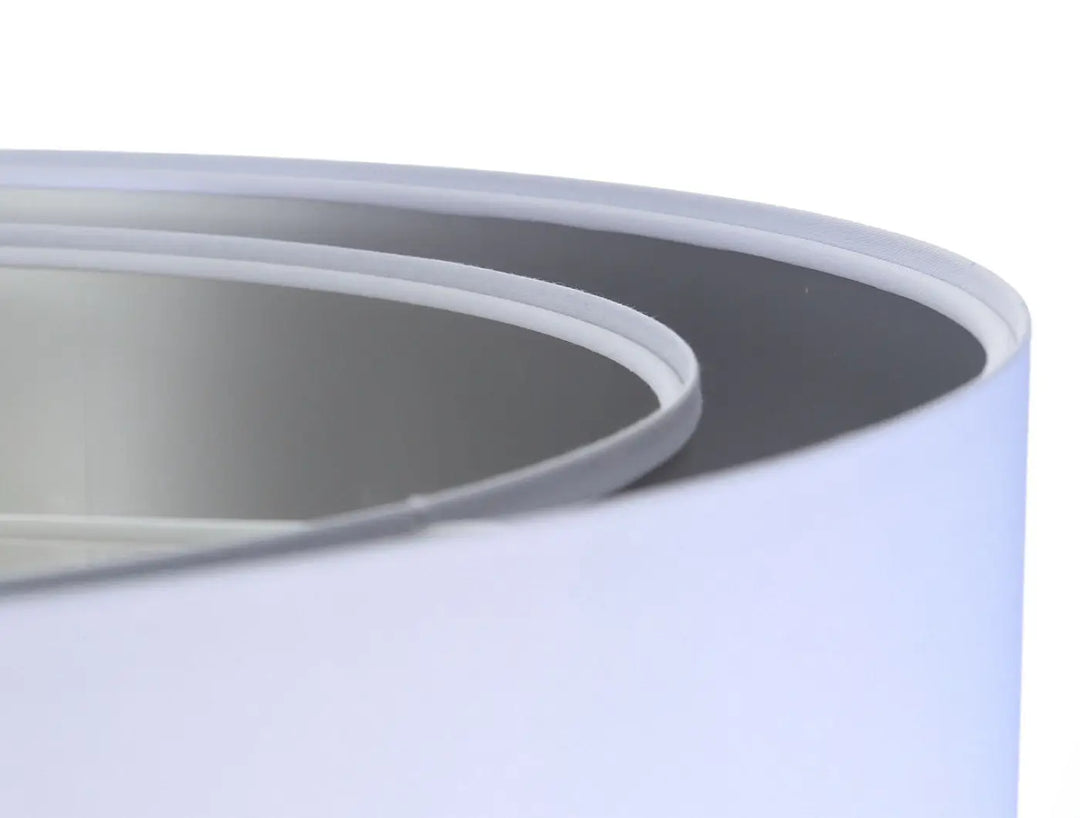Suspension luminaire blanche design moderne en cylindre blanc mat avec intérieur gris foncé pour éclairage élégant