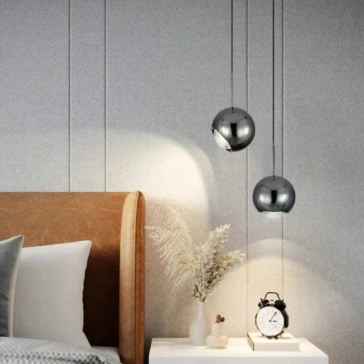 Suspension luminaire boule en verre effet miroir contemporain