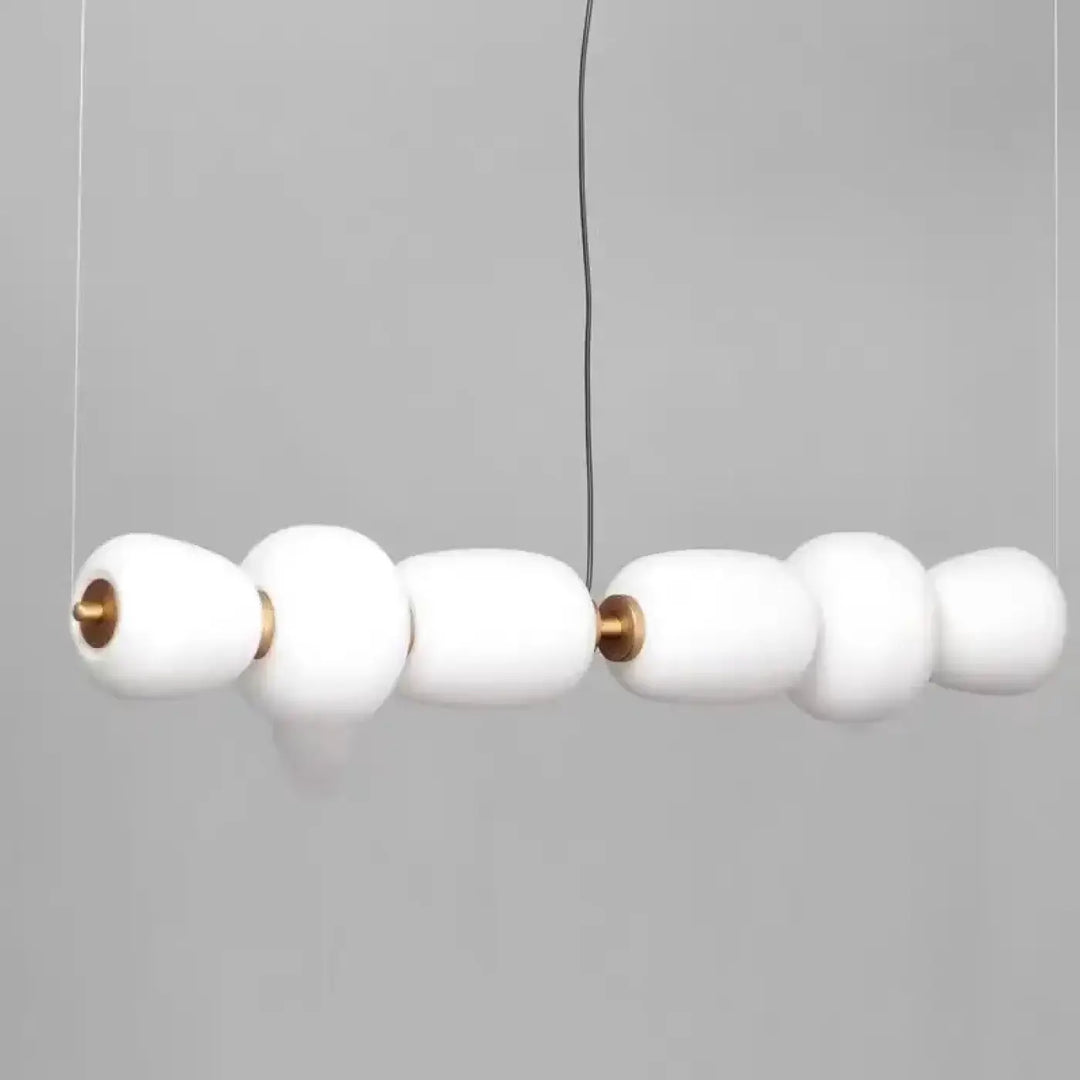 Suspension luminaire avec boules en verre et support en laiton chic