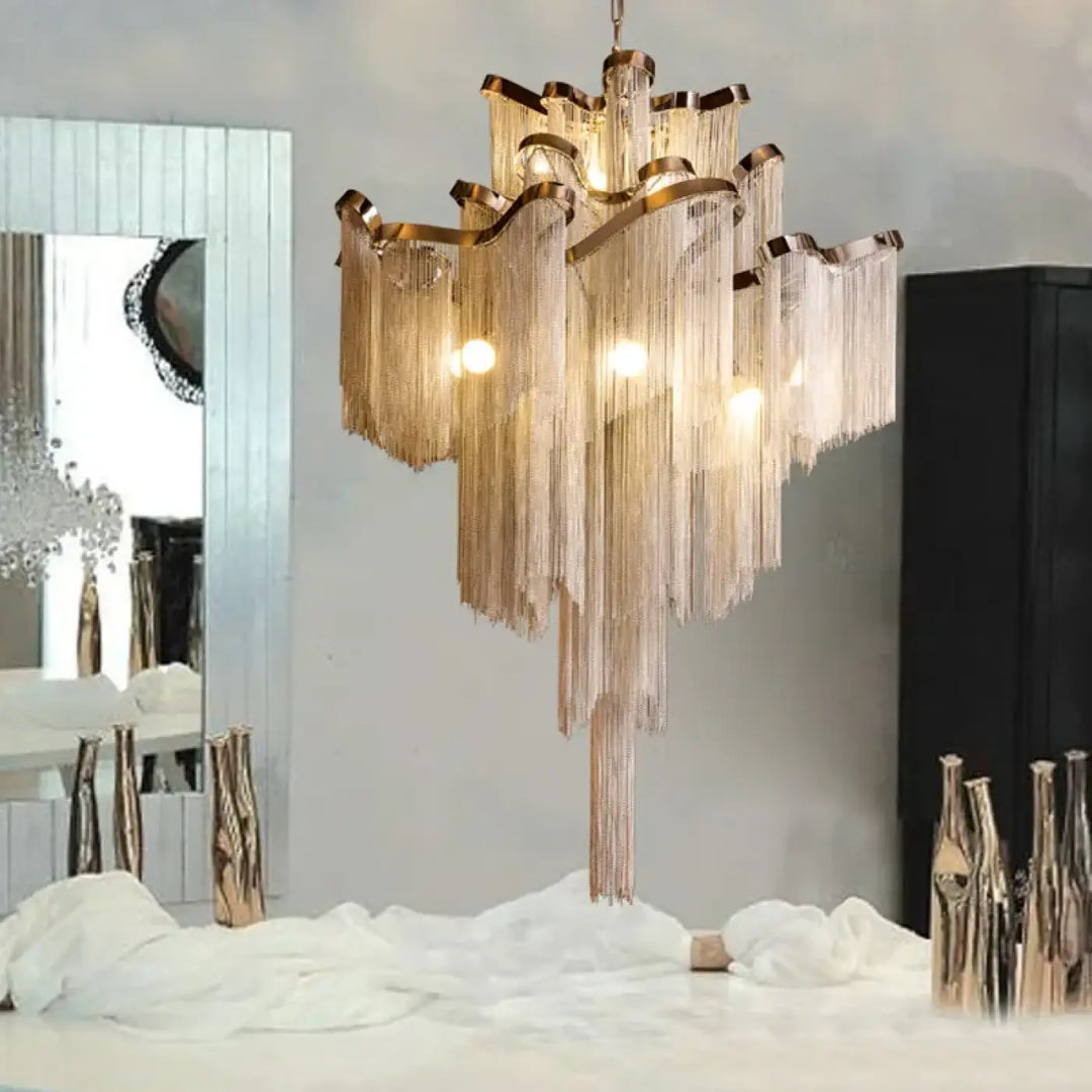 Suspension luminaire cascade chaînettes métalliques style art déco