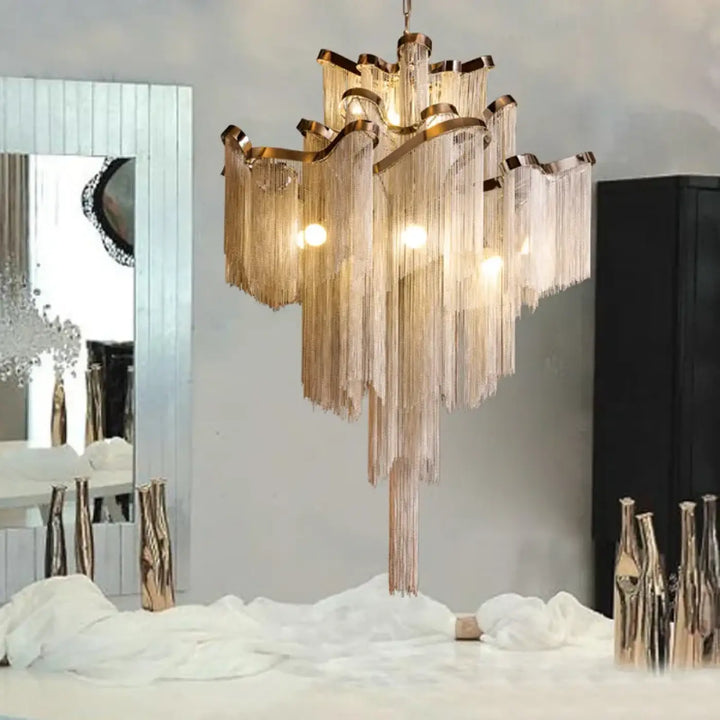 Suspension luminaire cascade chaînettes métalliques style art déco