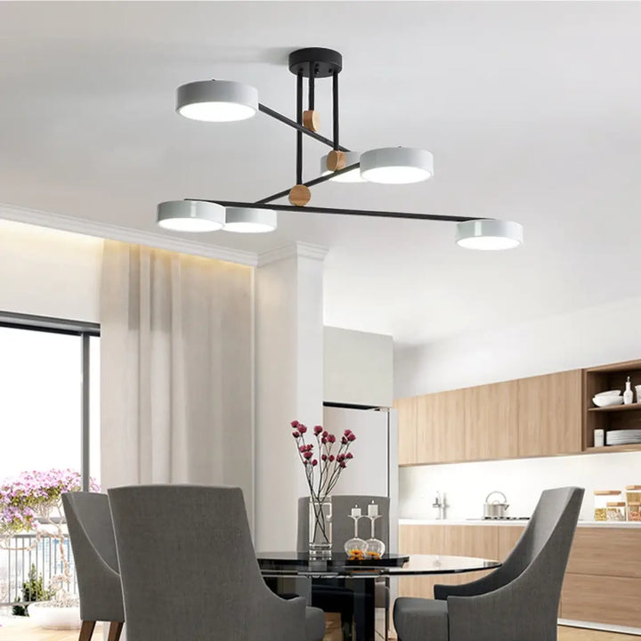 Suspension luminaire chic avec détails en bois et métal pour salon