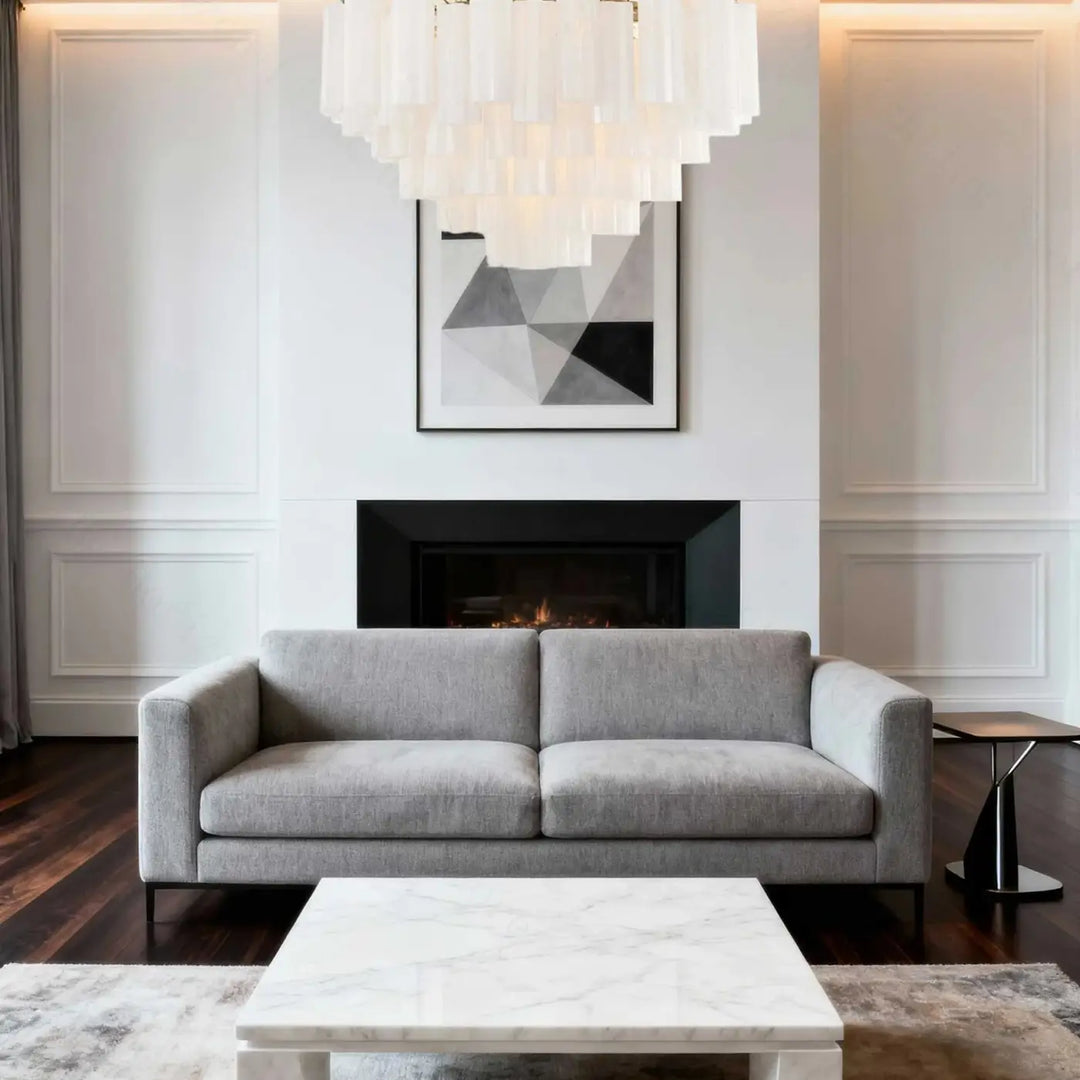 Gray upholstered sofa with clean lines and modern design complementing suspension luminaire chic rosila