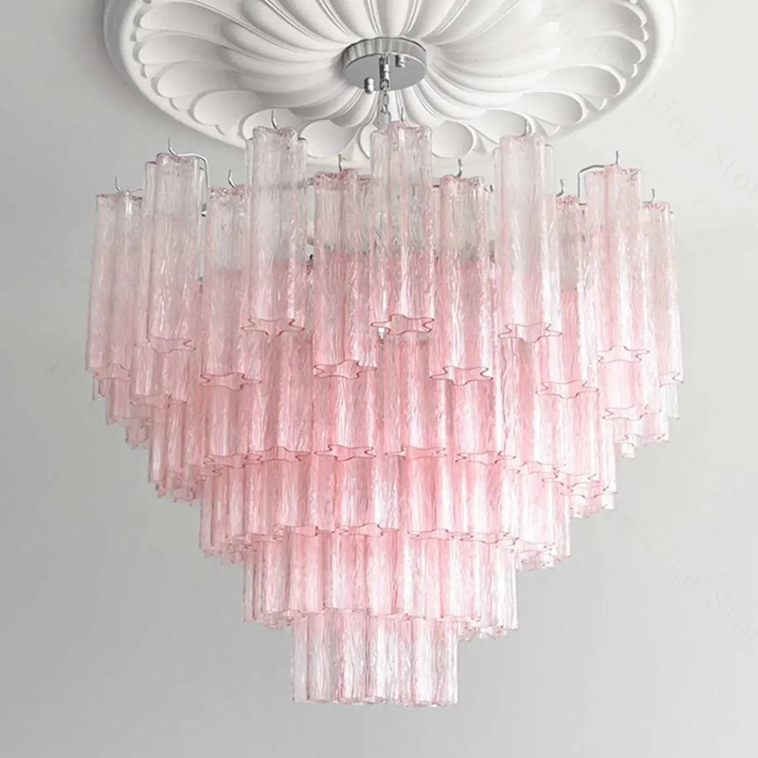 Suspension luminaire rosila avec tubes en verre rose translucide texturés et découpes étoiles pour un luminaire chic