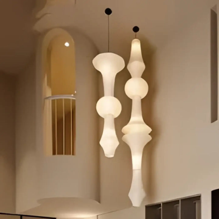 Suspension luminaire auralis blanc sculptural avec design segmenté moderne pour luminaire contemporaine élégant