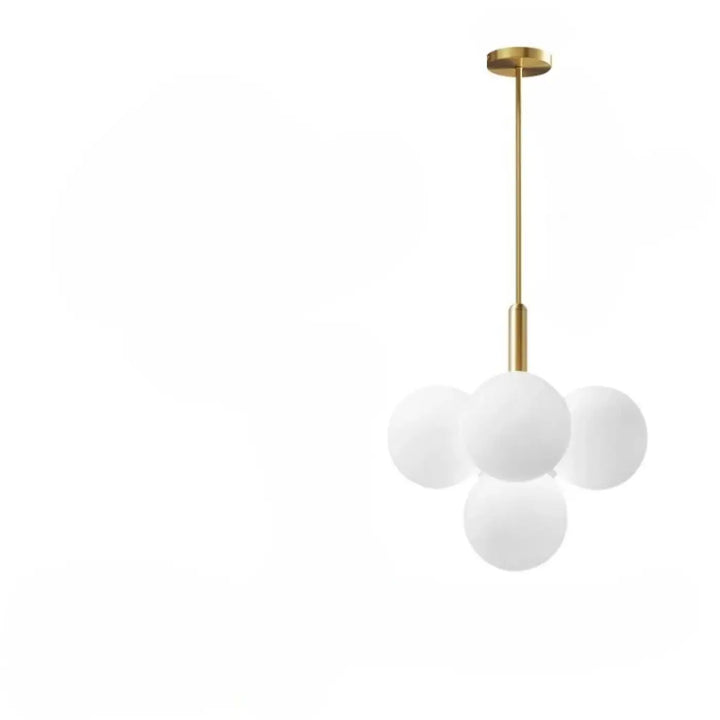 Suspension luminaire contemporaine golys avec barre en métal doré et quatre sphères en verre givré apporte un luminaire design élégant