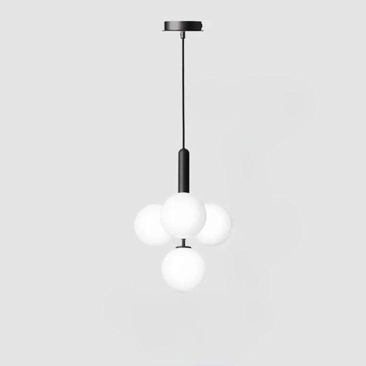Suspension luminaire contemporaine golys noire avec quatre globes en verre givré apporte un luminaire design élégant
