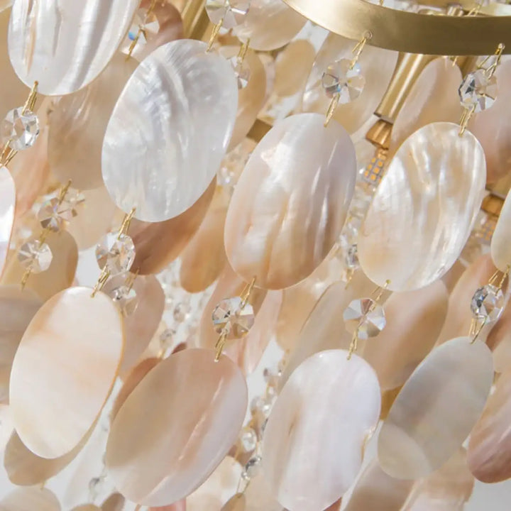Suspension luminaire en coque naturelle finition dorée