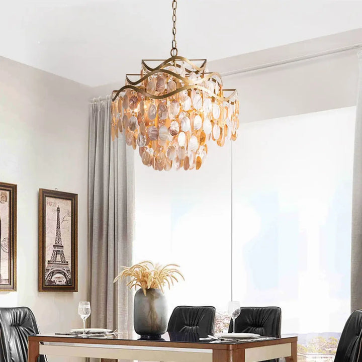 Suspension luminaire en coque naturelle finition dorée