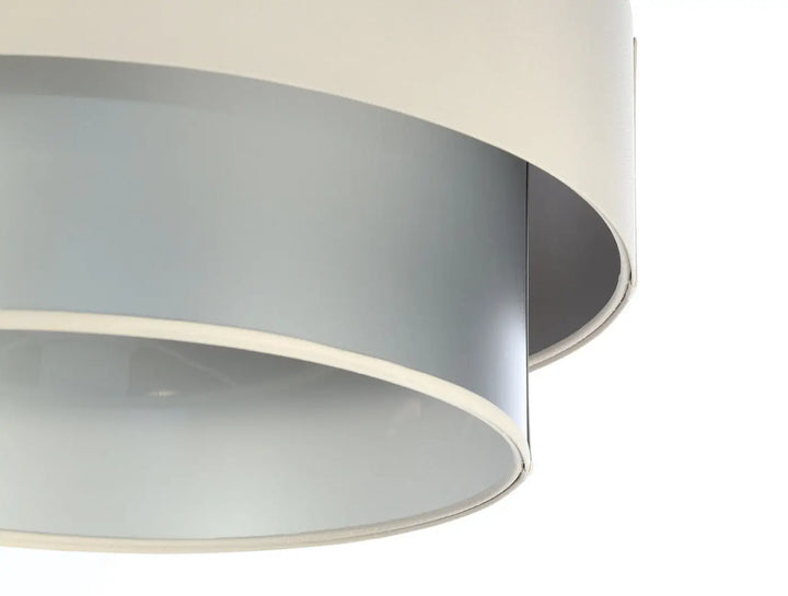 Suspension luminaire duo avec abat-jour circulaires concentriques en crème et argent mat moderne et épuré