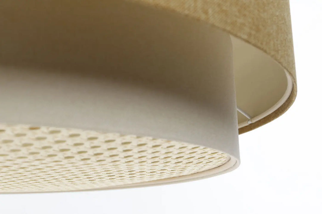 Suspension luminaire doblo boho elegant crème avec abat-jour cylindrique beige en tissu texturé et doublure perforée permet également un éclairage au-dessus d’une table