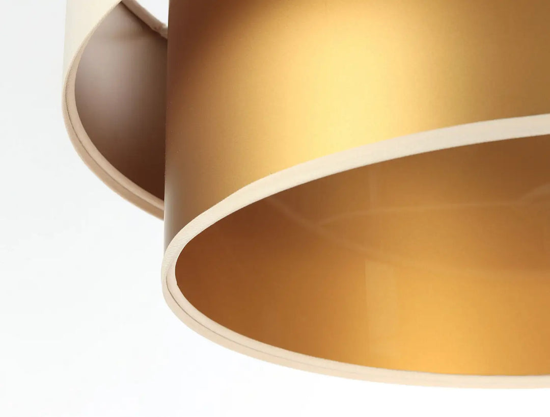 Suspension luminaire duo crème doré avec abat-jour cylindrique métallique lisse et bord crème