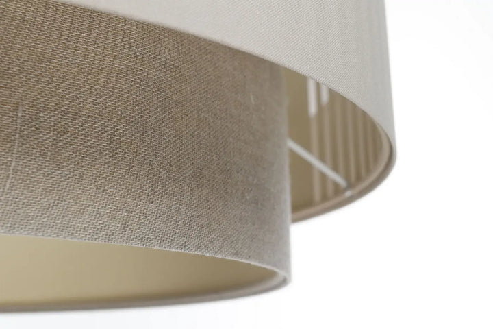 Suspension luminaire crème duo lami line avec abat-jour en lin beige à tissage texturé subtil et design cylindrique moderne