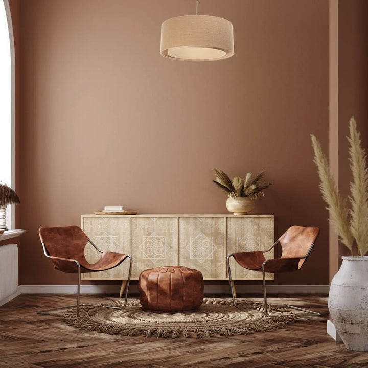 Brown leather butterfly chairs with metal frames complement bohème chic suspension luminaire crème duo boho beige ecru
