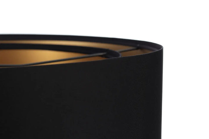Suspension luminaire cylindrique noire avec abat-jour en tissu noir et doublure intérieure dorée du modèle duo