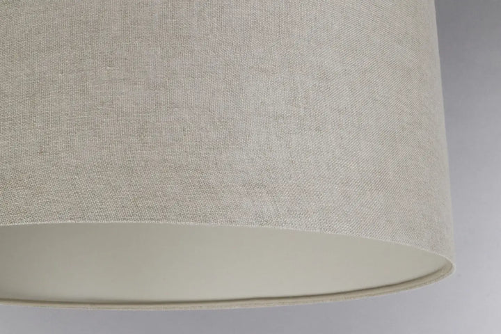 Suspension luminaire design beige en lin avec texture tissée subtile et bords arrondis lisses