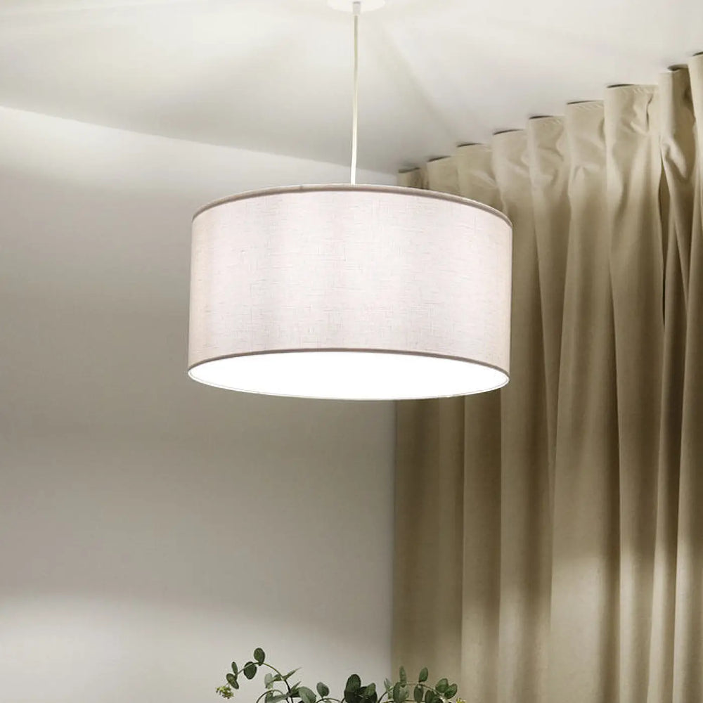 Suspension luminaire blanc crème cylindrique en tissu beige avec texture subtile et design minimaliste boho linen