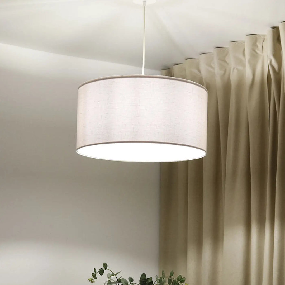 Suspension luminaire blanc crème cylindrique en tissu beige avec texture subtile et design minimaliste boho linen