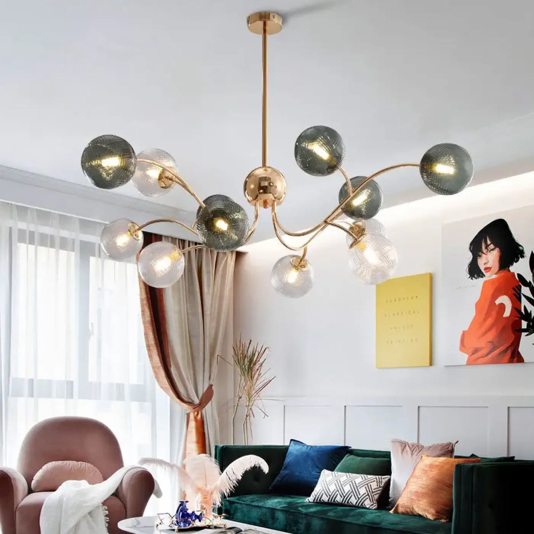 Suspension luminaire design contemporain norsa en laiton avec sphères en verre translucide gris et clair suspendues élégamment