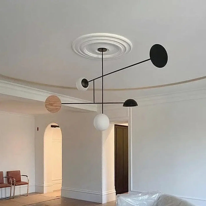 Suspension luminaire axis avec design minimaliste géométrique sphérique en noir blanc et tons bois moderne