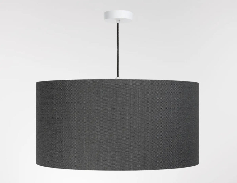 Suspension luminaire design graphite en tissu noir cylindrique avec fixation blanche au plafond minimaliste boho linen