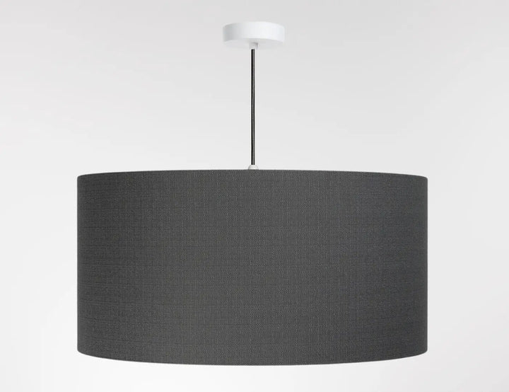 Suspension luminaire design graphite en tissu noir cylindrique avec fixation blanche au plafond minimaliste boho linen