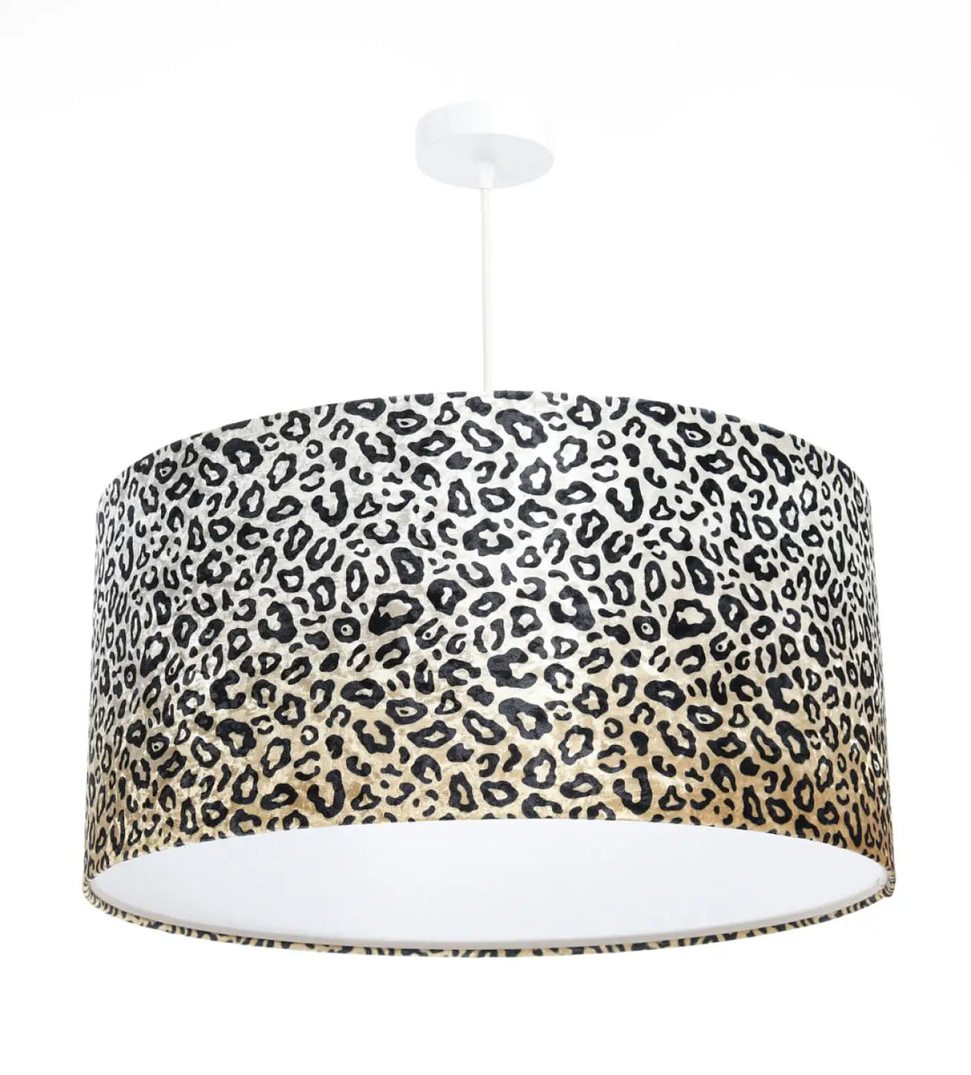 Suspension luminaire cylindrique design léopard crème et noir avec intérieur blanc pour un style safari élégant