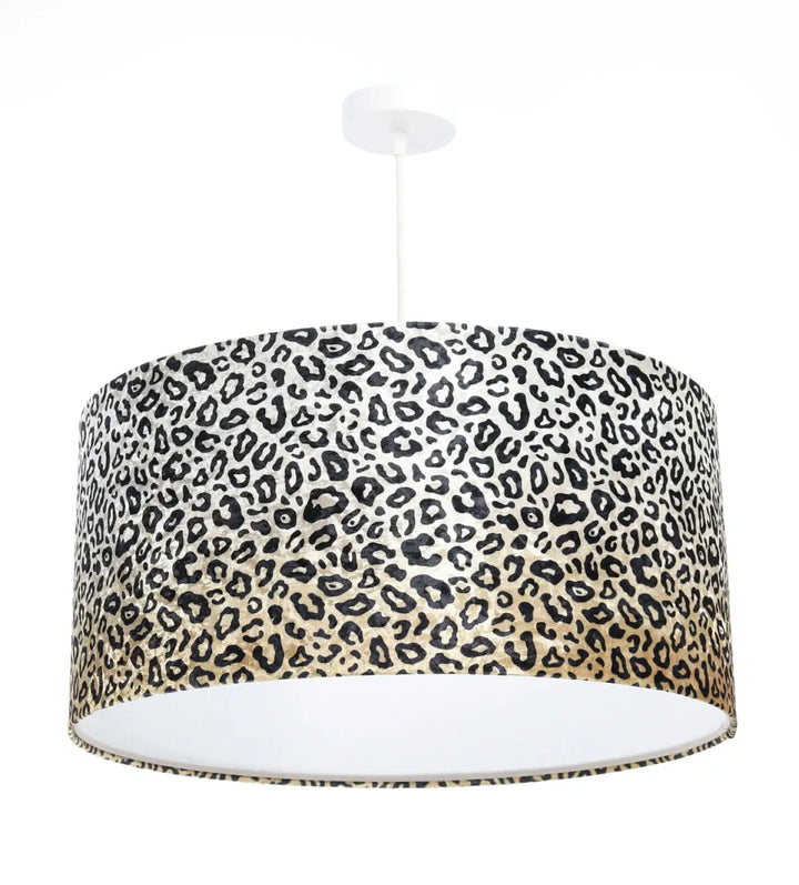 Suspension luminaire cylindrique design léopard crème et noir avec intérieur blanc pour un style safari élégant