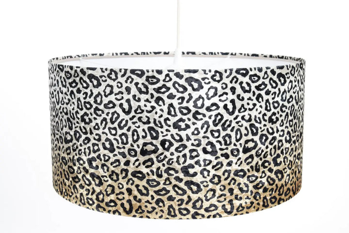 Suspension luminaire safari léopard crème noir avec abat-jour imprimé léopard noir et blanc et dégradé doré subtil