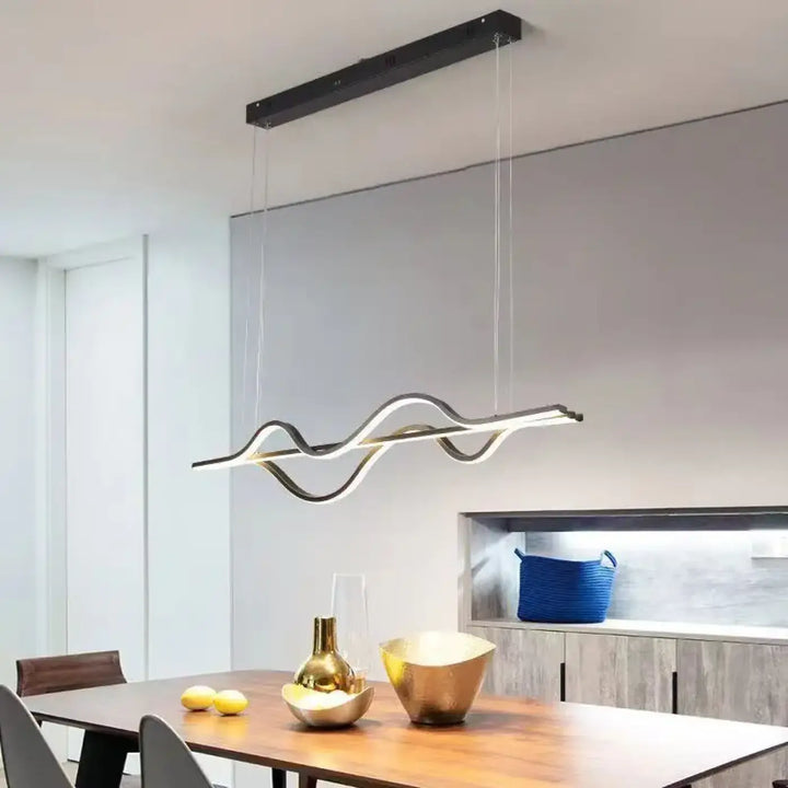 Suspension luminaire paloma noir et or en forme de vague avec finition métallique moderne pour salle à manger design