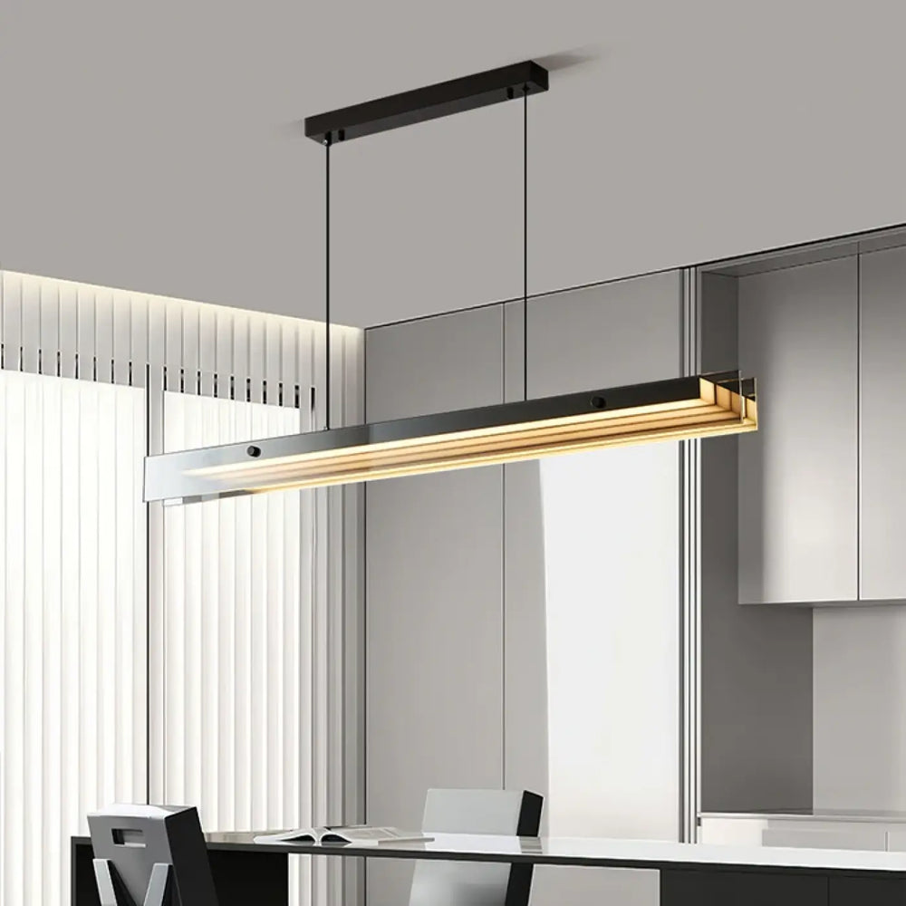 Suspension luminaire design moderne allongée finition dorée noir