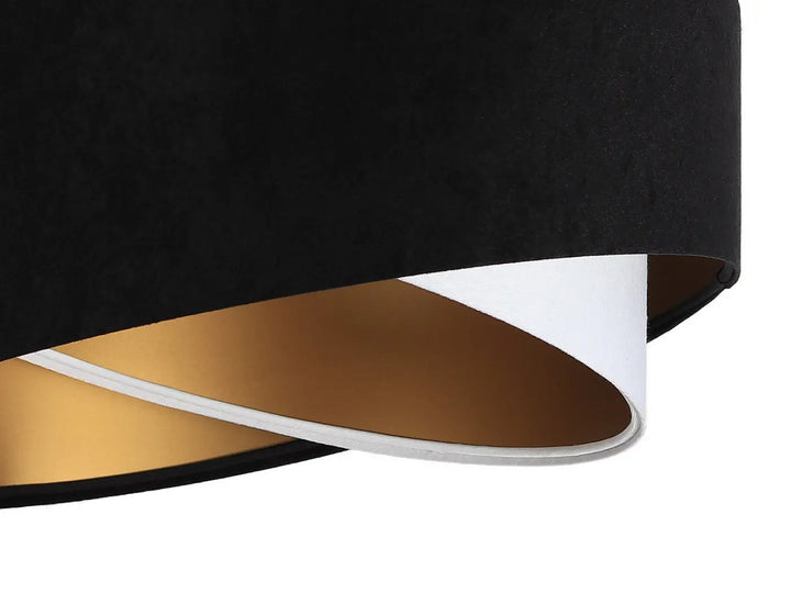 Suspension luminaire galaxy auric noir avec abat-jour en velours noir aux reflets dorés blancs intérieurs