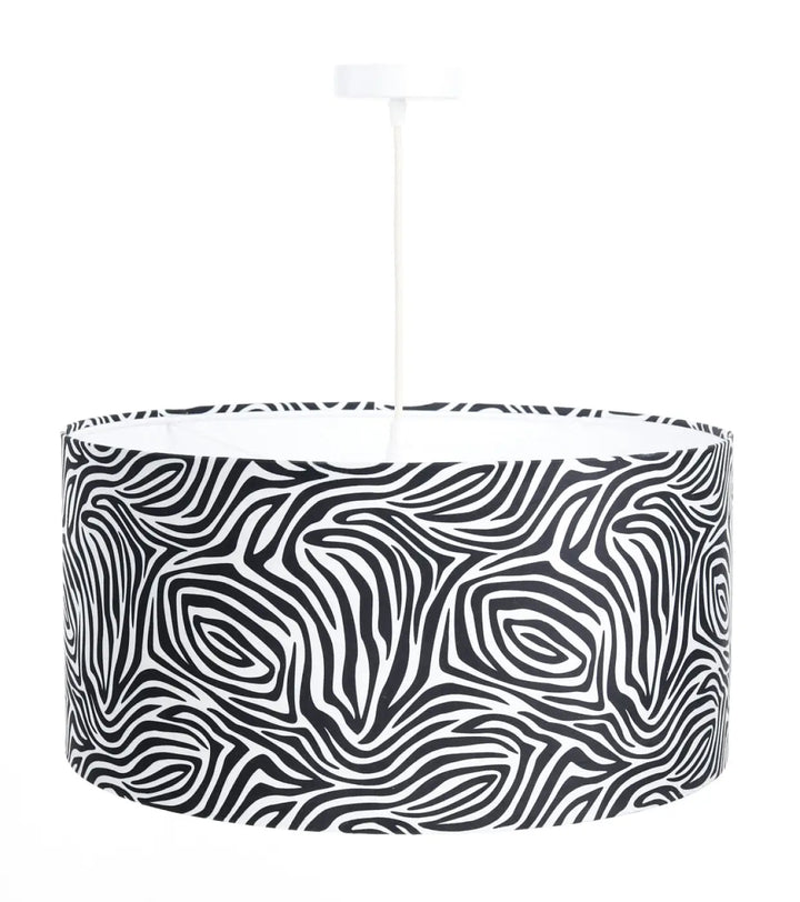 Suspension luminaire safarI noir blanc avec abat-jour tambour motif zèbre et tige blanche suspendue