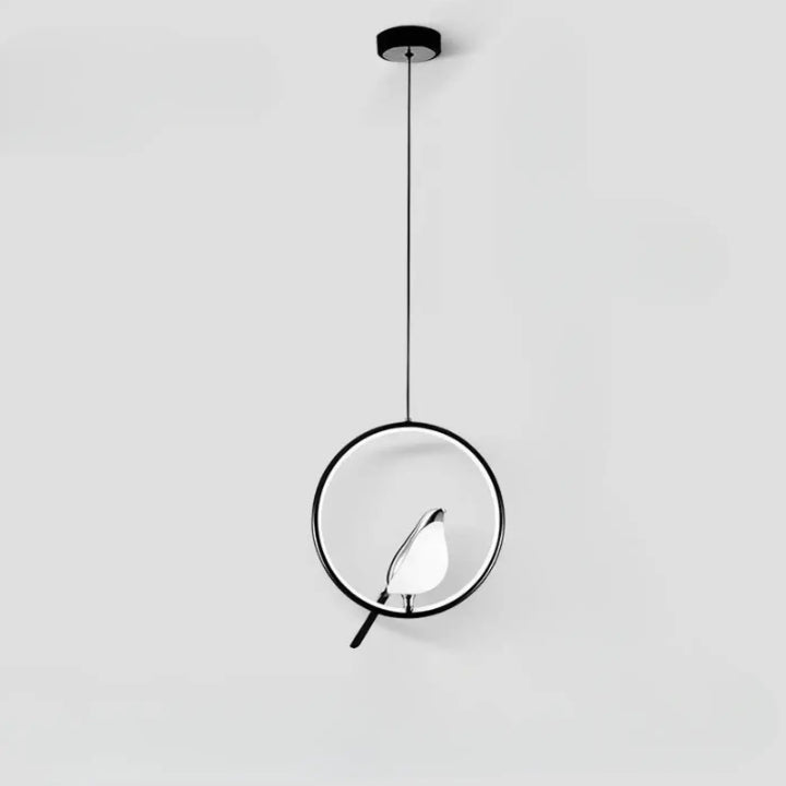 Suspension luminaire fody noir minimaliste avec halo lumineux et silhouette d oiseau éclairée dans un design moderne