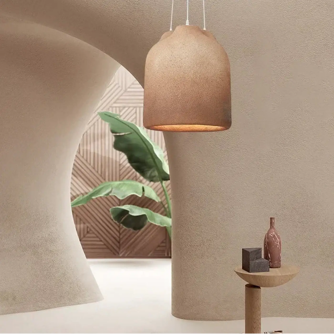 Suspension luminaire mineris en céramique texturée aux tons chauds avec un design sculptural pour décoration intérieure