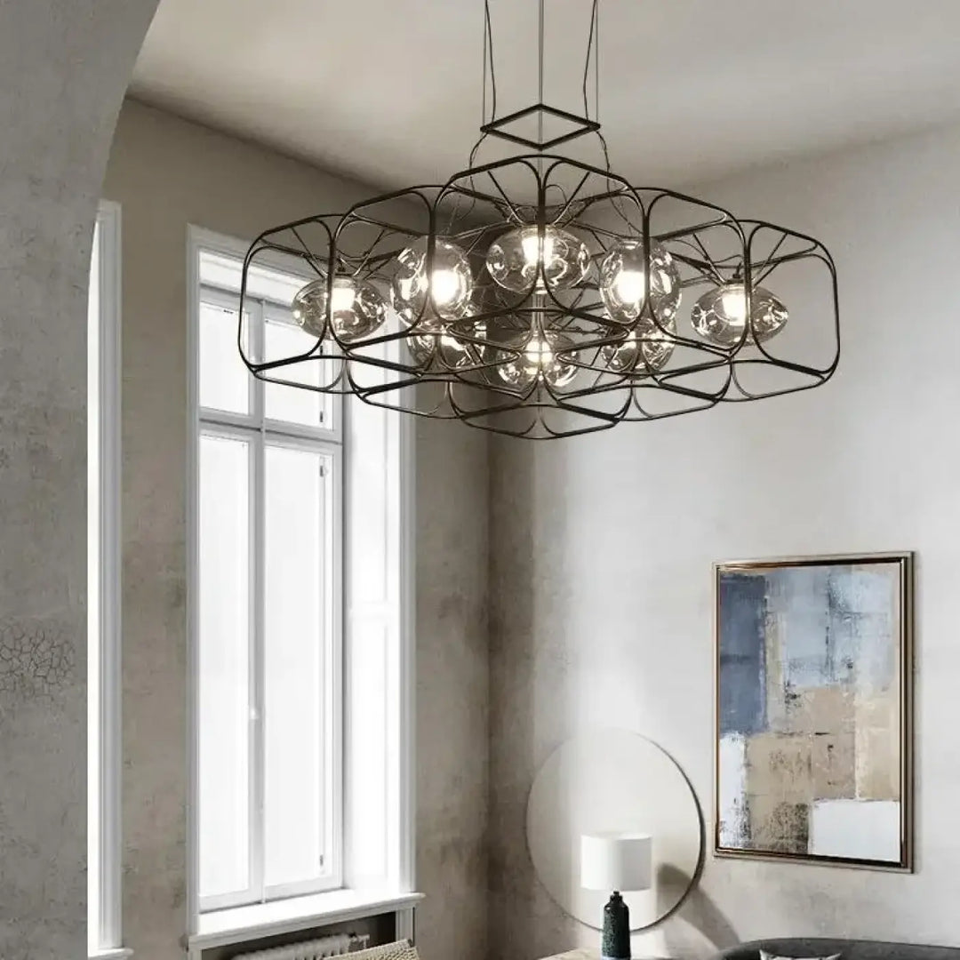Suspension luminaire nexora en métal noir avec design cage géométrique et ampoules globes en verre clair