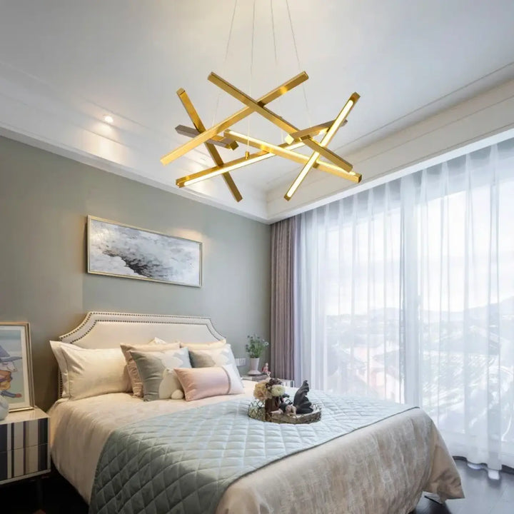 Suspension luminaire kados doré en barres géométriques entrecroisées idéale pour éclairage blanc chaud et blanc froid mètres carrés