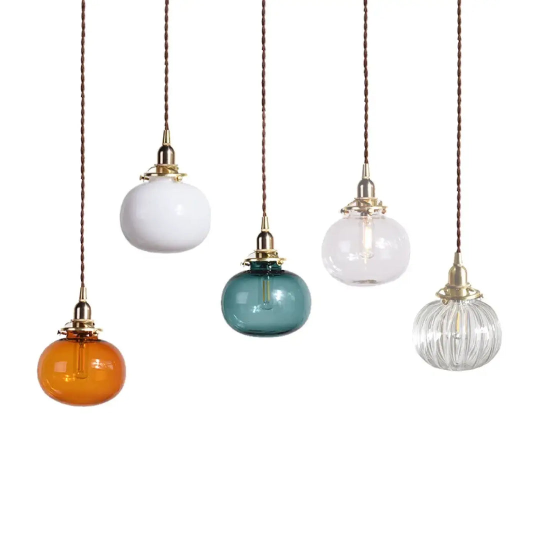 Suspension luminaire design verre et base dorée élégance moderne
