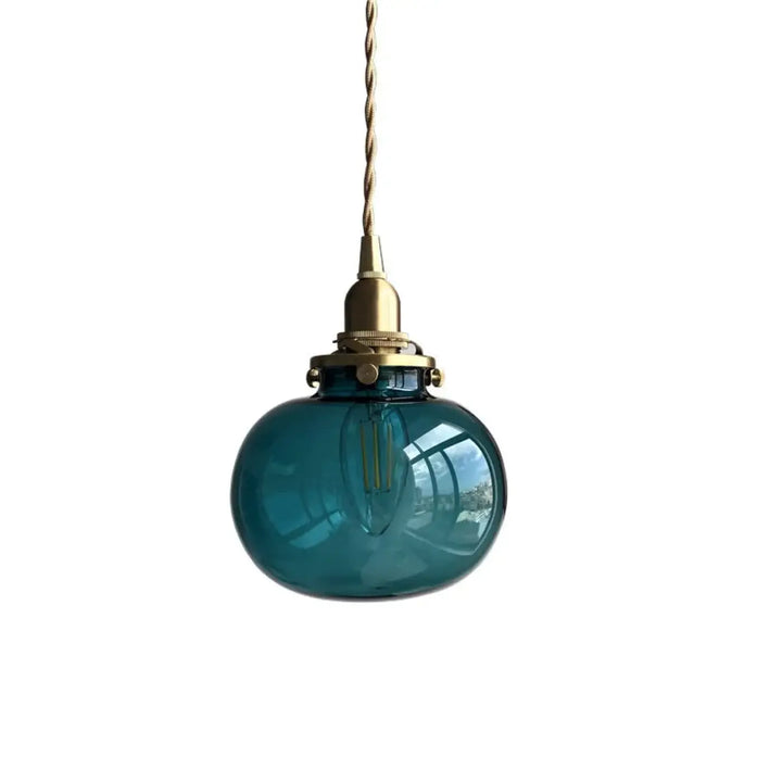 Suspension luminaire design verre et base dorée élégance moderne