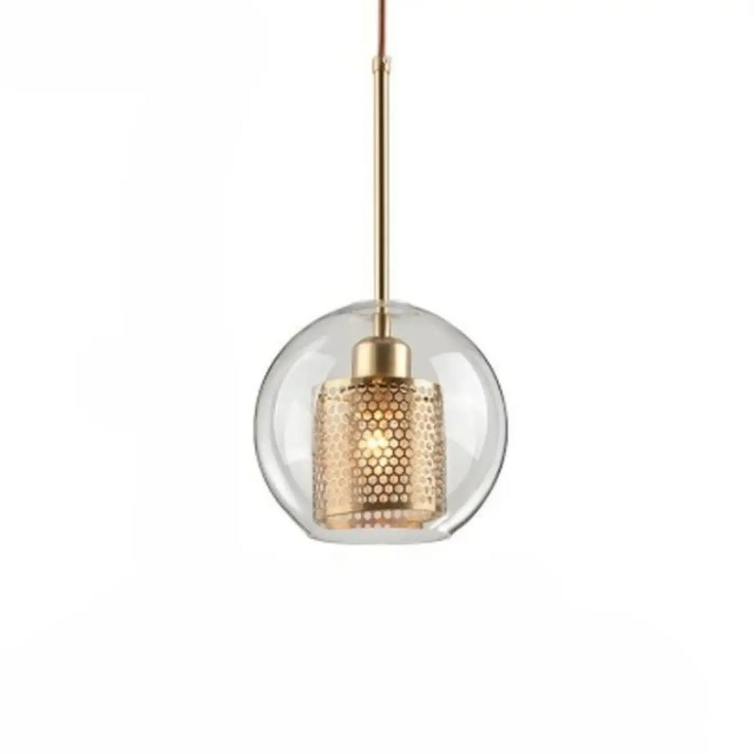 Suspension luminaire zelor avec globe en verre clair et abat-jour cylindrique doré perforé design moderne