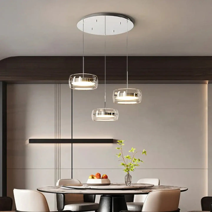 Suspension luminaire trida avec luminaires suspendus minimalistes en verre clair et accents chromés blanc chaud et blanc froid