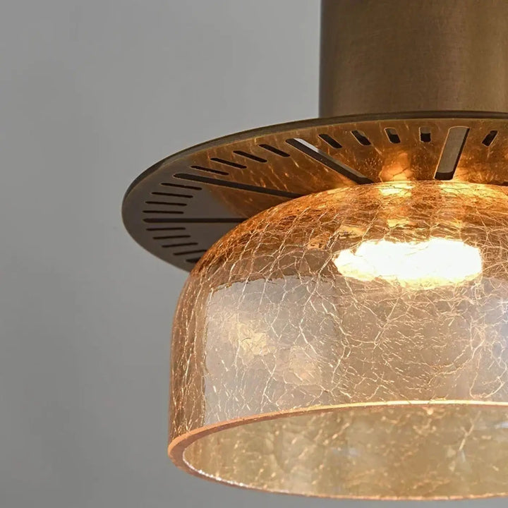Suspension luminaire design en verre texturé et métal doré moderne