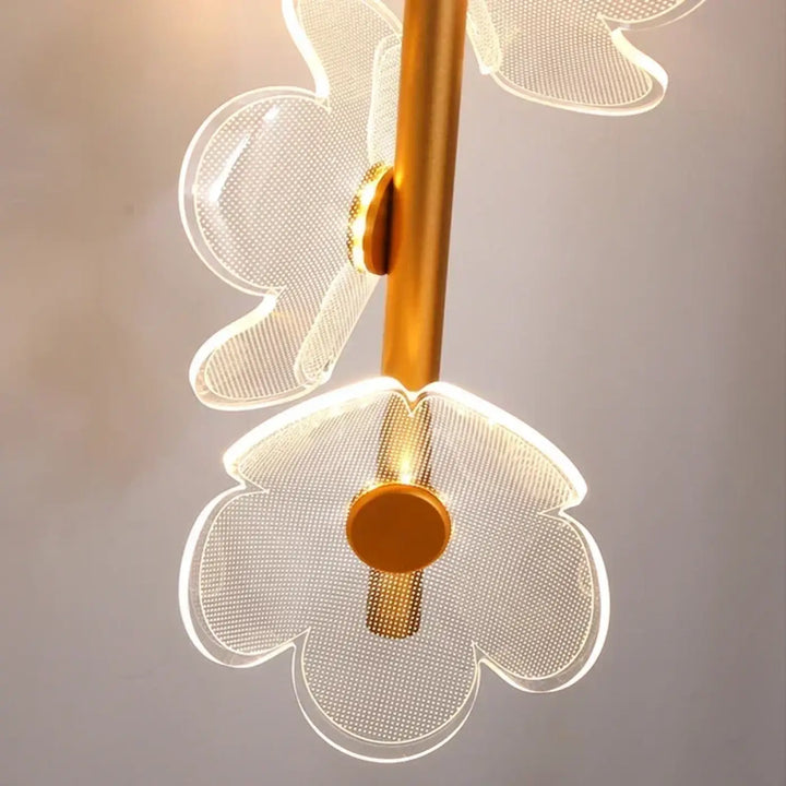 Suspension luminaire dorée avec 3 fleurs blanches en LED


