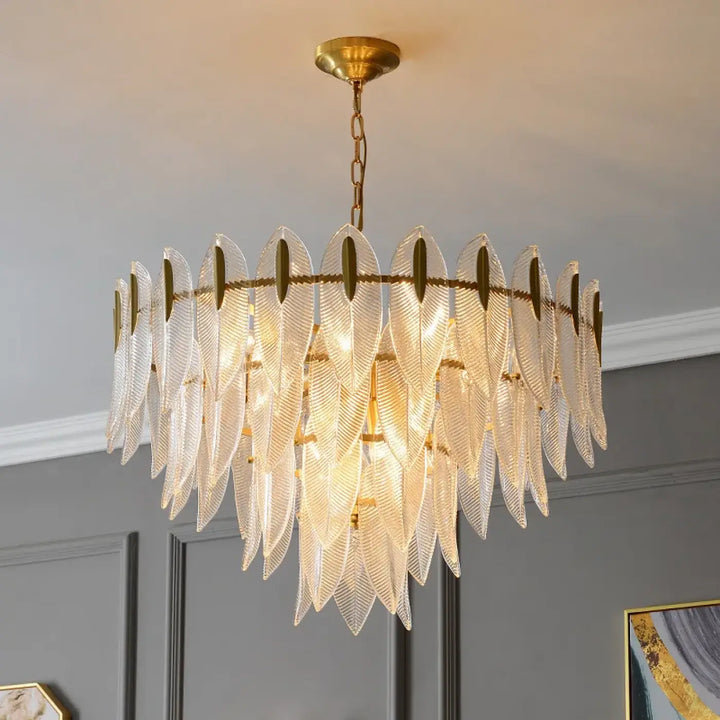 Suspension luminaire dorée en verre sculpté style art déco chic