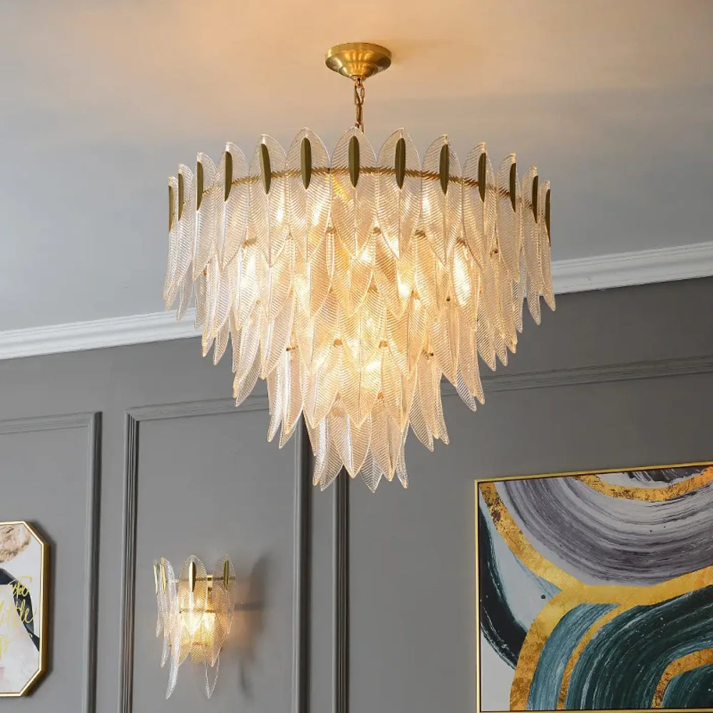 Suspension luminaire dorée en verre sculpté style art déco chic