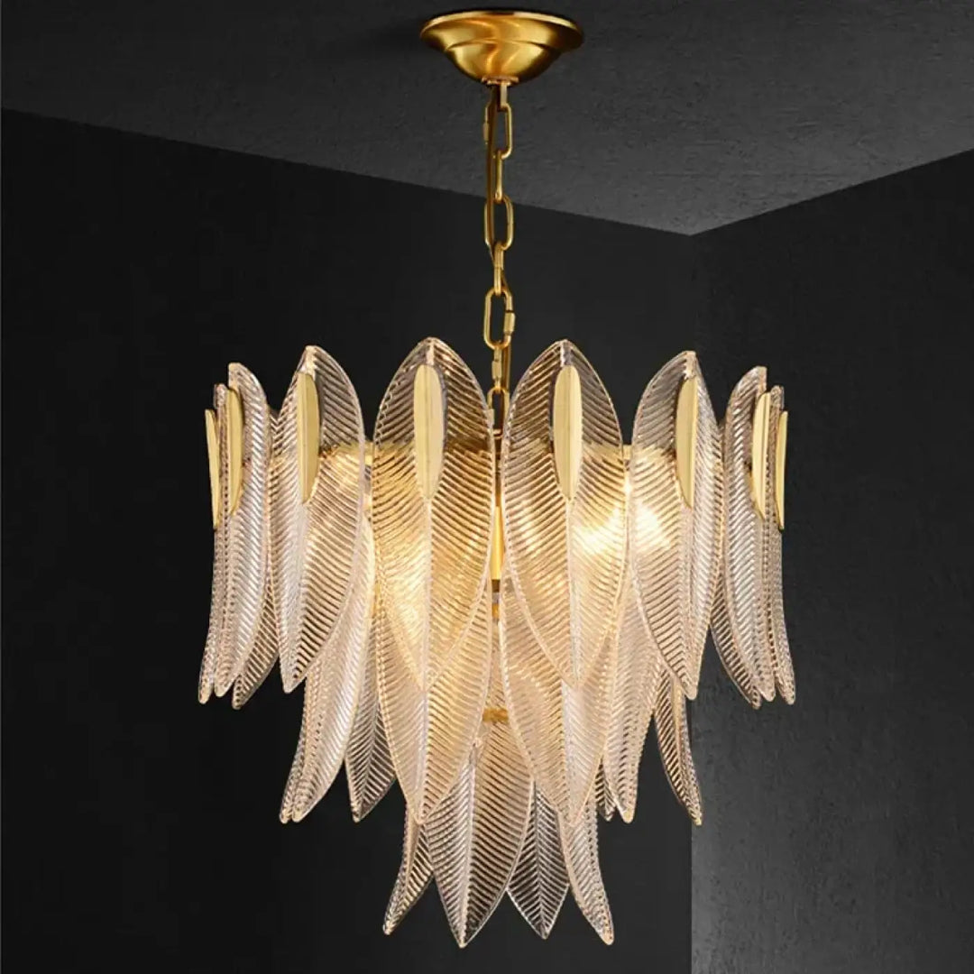 Suspension luminaire dorée en verre sculpté style art déco chic